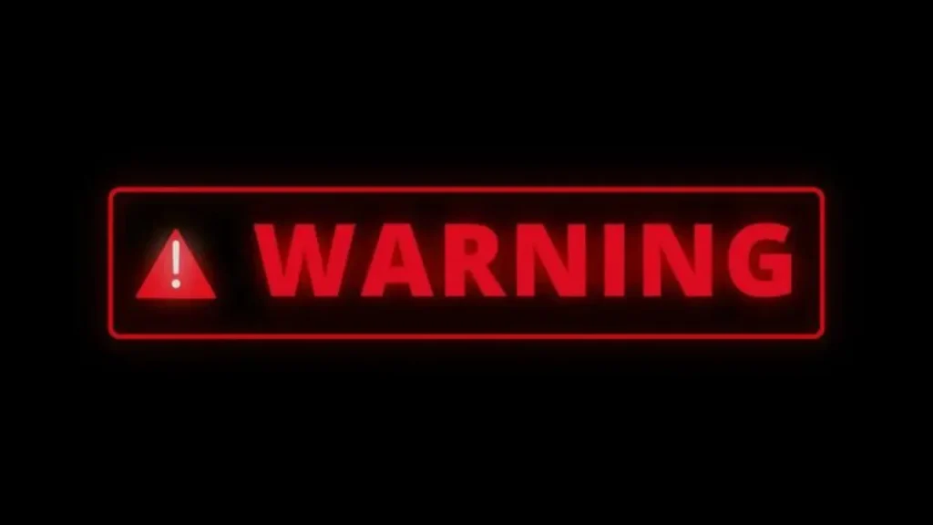 Red glowing warning text box with exclamation mark icon on black background[cite: 13]